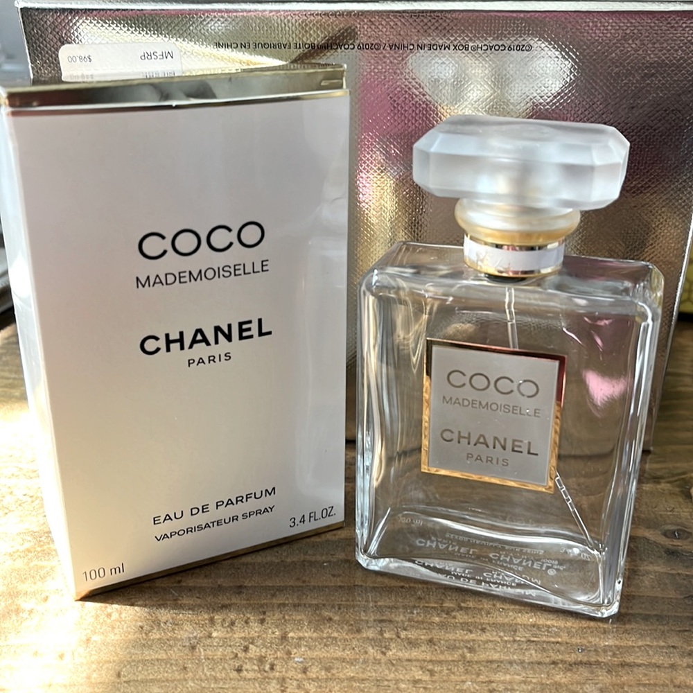 Empty COCO Chanel mademoiselle perfume bottle and box